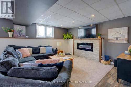 3645 Murvale Road, Frontenac (Frontenac South), ON - Indoor Photo Showing Living Room With Fireplace