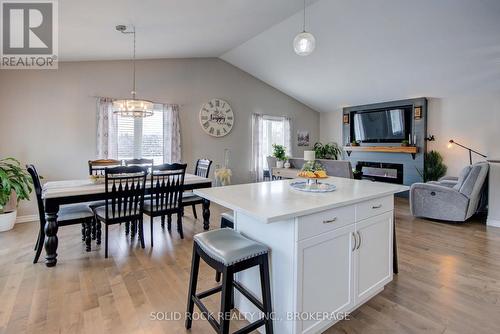3645 Murvale Road, Frontenac (Frontenac South), ON - Indoor Photo Showing Dining Room With Fireplace