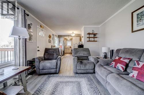 Living Room - 1510 12 Avenue N, Lethbridge, AB - Indoor Photo Showing Living Room