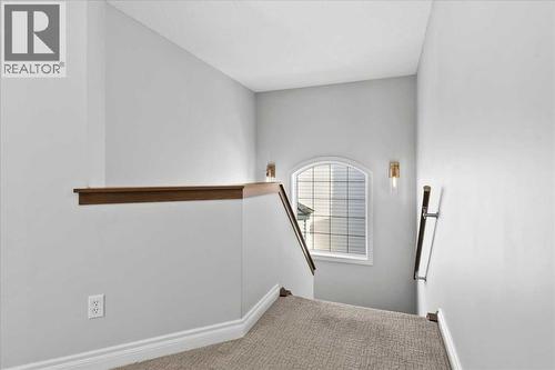 255 Gleneagles View, Cochrane, AB - Indoor Photo Showing Other Room