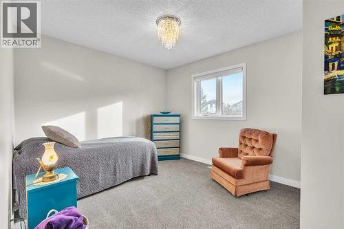 103 Panamount Crescent Nw, Calgary, AB - Indoor Photo Showing Bedroom