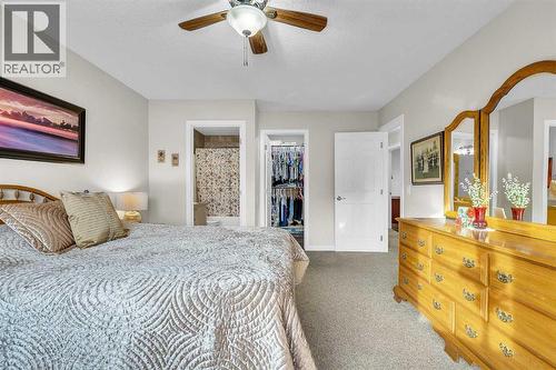 103 Panamount Crescent Nw, Calgary, AB - Indoor Photo Showing Bedroom