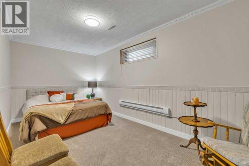 103 Panamount Crescent Nw, Calgary, AB - Indoor Photo Showing Bedroom
