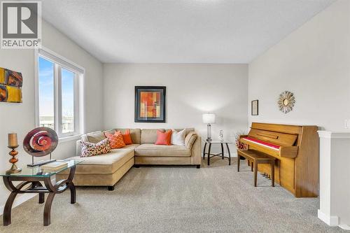 103 Panamount Crescent Nw, Calgary, AB - Indoor Photo Showing Living Room