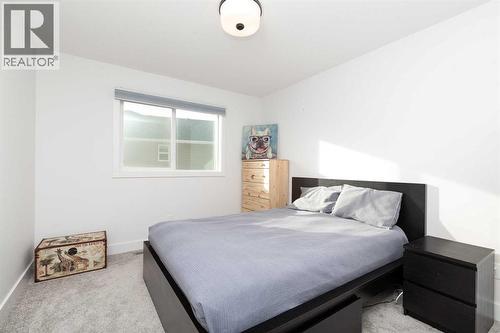 131 Goldenrod Way W, Lethbridge, AB - Indoor Photo Showing Bedroom