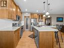 108 Pantego Rise Nw, Calgary, AB  - Indoor Photo Showing Kitchen With Stainless Steel Kitchen With Upgraded Kitchen 