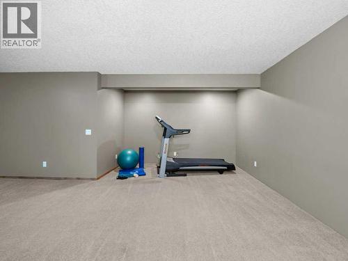 108 Pantego Rise Nw, Calgary, AB - Indoor Photo Showing Gym Room