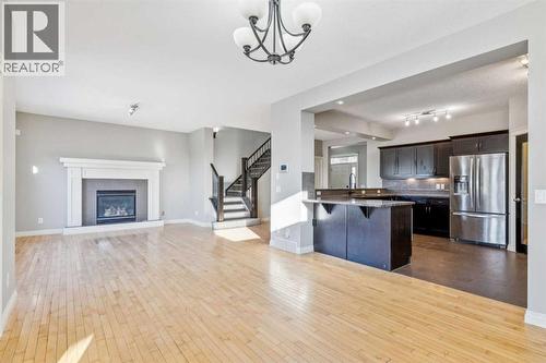 Dining Area #2 - 110 Heritage Place Ne, Cochrane, AB - Indoor With Fireplace
