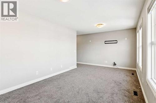 Bonus Room #2 - 110 Heritage Place Ne, Cochrane, AB - Indoor Photo Showing Other Room