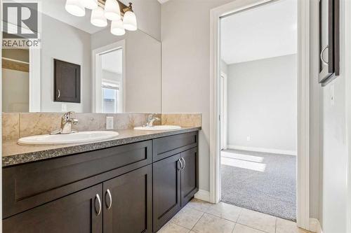 Jack & Jill Bathroom - 110 Heritage Place Ne, Cochrane, AB - Indoor Photo Showing Bathroom