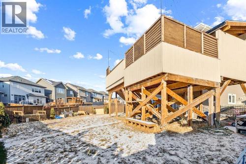 Back of Deck - 110 Heritage Place Ne, Cochrane, AB - Outdoor With Deck Patio Veranda
