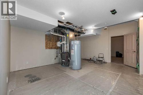 54 Cranford Bay Se, Calgary, AB - Indoor Photo Showing Garage