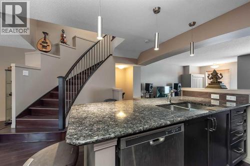 54 Cranford Bay Se, Calgary, AB - Indoor Photo Showing Kitchen With Double Sink