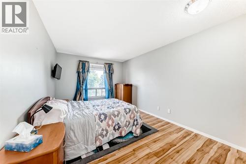 306, 1712 38 Street Se, Calgary, AB - Indoor Photo Showing Bedroom