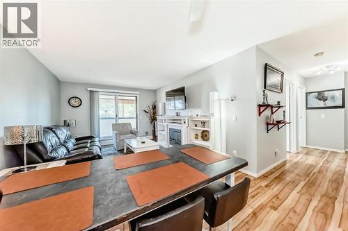 306, 1712 38 Street Se, Calgary, AB - Indoor Photo Showing Living Room