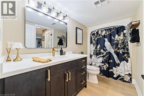 Features new custom vanity - 216 Plains Road W Unit# B403, Burlington, ON - Indoor Photo Showing Bathroom