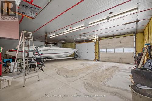 Heated side, newer concrete - 20385 Port Road, Chatham-Kent (Raleigh), ON - Indoor Photo Showing Garage