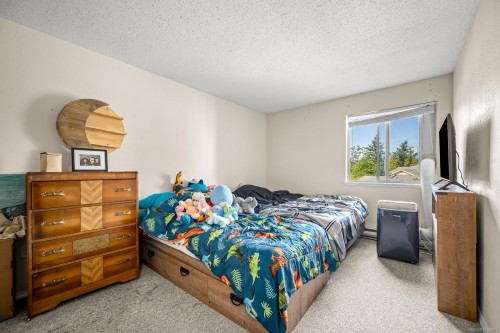 301-1050 Braidwood Rd, Courtenay, BC - Indoor Photo Showing Bedroom