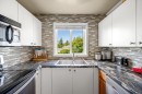 301-1050 Braidwood Rd, Courtenay, BC  - Indoor Photo Showing Kitchen With Double Sink 