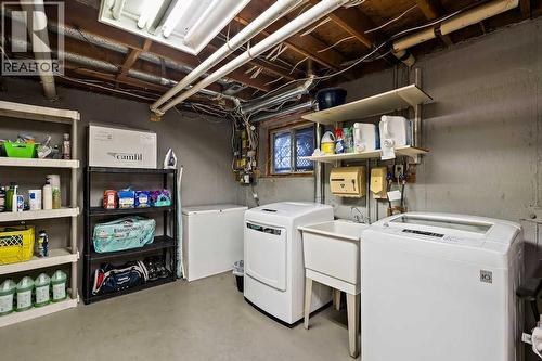 108 Lynnbrook Bay Se, Calgary, AB - Indoor Photo Showing Laundry Room