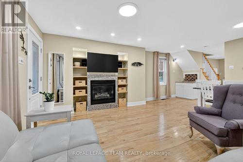 309 Elmgrove Avenue, Ottawa, ON - Indoor Photo Showing Living Room With Fireplace