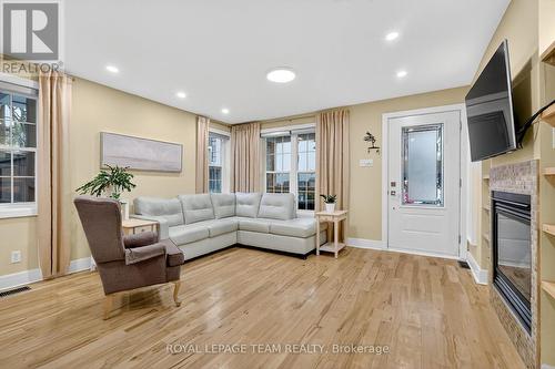 309 Elmgrove Avenue, Ottawa, ON - Indoor Photo Showing Living Room With Fireplace