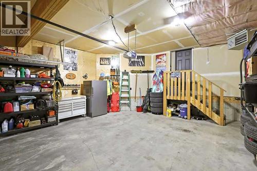 6 Westmount Circle, Okotoks, AB - Indoor Photo Showing Garage