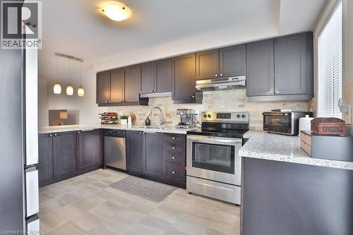 1133 Duignan Crescent, Milton, ON - Indoor Photo Showing Kitchen With Stainless Steel Kitchen