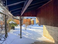 covered porch leading to back yard - 
