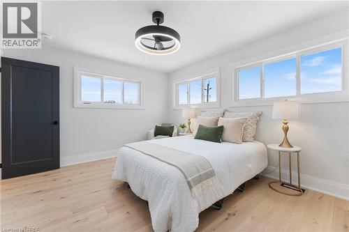 Spacious primary with loads of natural light, walk-in closet, & ensuite. - 50 Fife Street W, Caledonia, ON - Indoor Photo Showing Bedroom