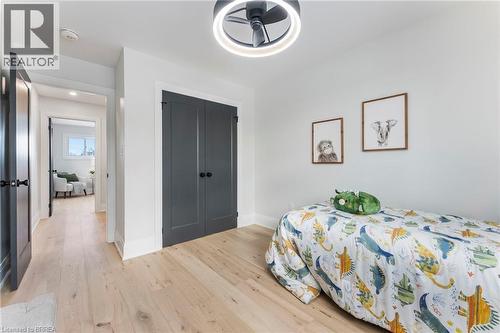 Hardwood flooring, upgraded doors and ceiling fan. - 50 Fife Street W, Caledonia, ON - Indoor Photo Showing Bedroom