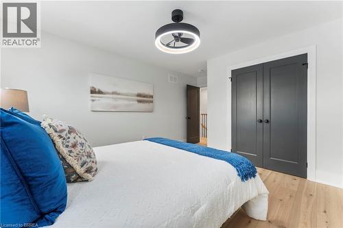 Hardwood flooring, upgraded doors and ceiling fan. - 50 Fife Street W, Caledonia, ON - Indoor Photo Showing Bedroom