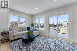 Bright & airy open concept space with feature wall. - 