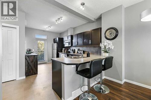 68 New Brighton Point Se, Calgary, AB - Indoor Photo Showing Kitchen