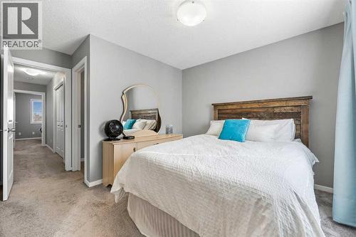 68 New Brighton Point Se, Calgary, AB - Indoor Photo Showing Bedroom