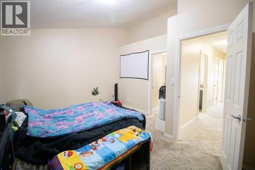 Primary bedroom upper level - 408, 150 Vanier Drive, Red Deer, AB - Indoor Photo Showing Bedroom