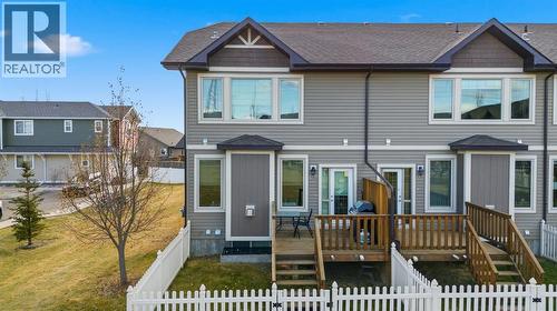 North viewing South - 408, 150 Vanier Drive, Red Deer, AB - Outdoor With Deck Patio Veranda With Facade