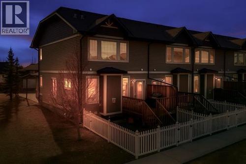 Night photo of backyard - 408, 150 Vanier Drive, Red Deer, AB - Outdoor