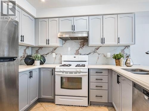 9 Revelstoke Place, Brampton, ON - Indoor Photo Showing Kitchen With Double Sink