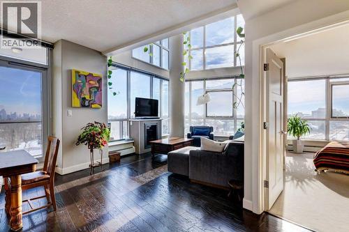 So much light and space - 602, 99 Spruce Place Sw, Calgary, AB - Indoor Photo Showing Living Room