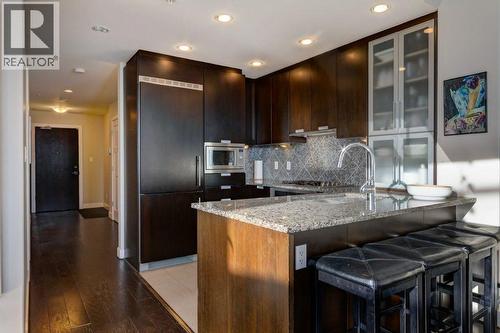 602, 99 Spruce Place Sw, Calgary, AB - Indoor Photo Showing Kitchen With Upgraded Kitchen