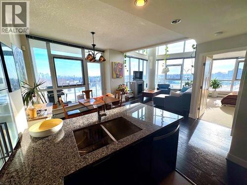 602, 99 Spruce Place Sw, Calgary, AB - Indoor Photo Showing Kitchen With Double Sink