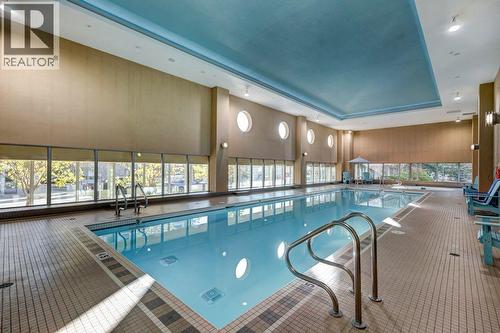 602, 99 Spruce Place Sw, Calgary, AB - Indoor Photo Showing Other Room With In Ground Pool