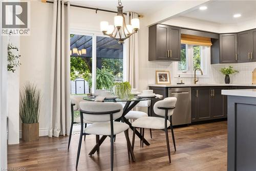 Bright eat-in kitchen with sliding doors leading directly to the backyard. - 391 Strawberry Crescent, Waterloo, ON - Indoor