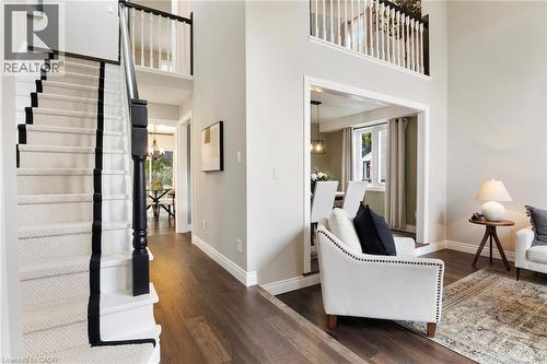 Fresh interior paint and a custom staircase runner, both updated in 2025. - 391 Strawberry Crescent, Waterloo, ON - Indoor Photo Showing Other Room