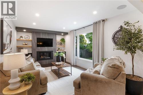 391 Strawberry Crescent, Waterloo, ON - Indoor Photo Showing Living Room With Fireplace