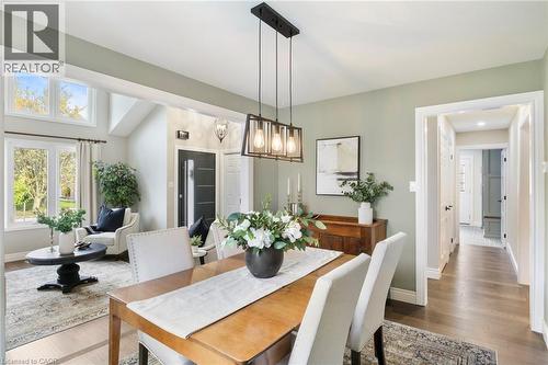 Dining room opens to the living room, creating an inviting space for gatherings while maintaining separation from the kitchen for a more formal feel. - 391 Strawberry Crescent, Waterloo, ON - Indoor Photo Showing Dining Room
