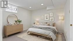 Virtually staged - basement bedroom - 