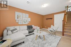 Virtually Staged- Basement Family Room - 