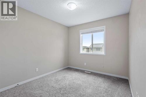 44 Howse Drive Ne, Calgary, AB - Indoor Photo Showing Other Room